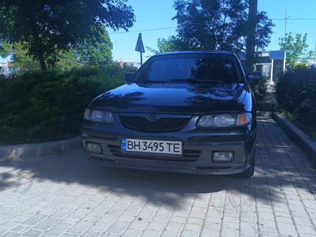 Синій Мазда 626, об'ємом двигуна 2 л та пробігом 345 тис. км за 3000 $, фото 1 на Automoto.ua