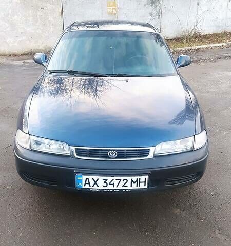 Синій Мазда 626, об'ємом двигуна 2 л та пробігом 390 тис. км за 3200 $, фото 1 на Automoto.ua
