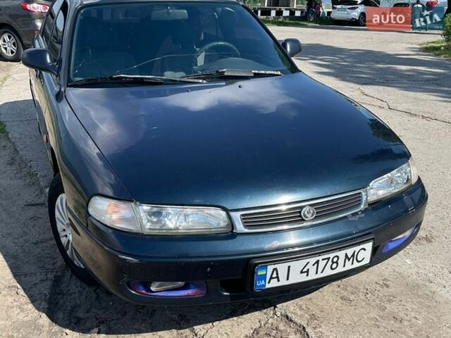 Синій Мазда 626, об'ємом двигуна 1.84 л та пробігом 318 тис. км за 1400 $, фото 1 на Automoto.ua