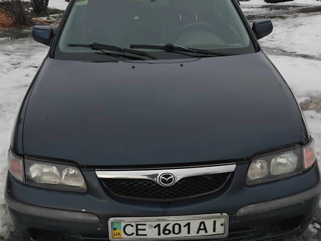 Синій Мазда 626, об'ємом двигуна 2 л та пробігом 300 тис. км за 1016 $, фото 1 на Automoto.ua