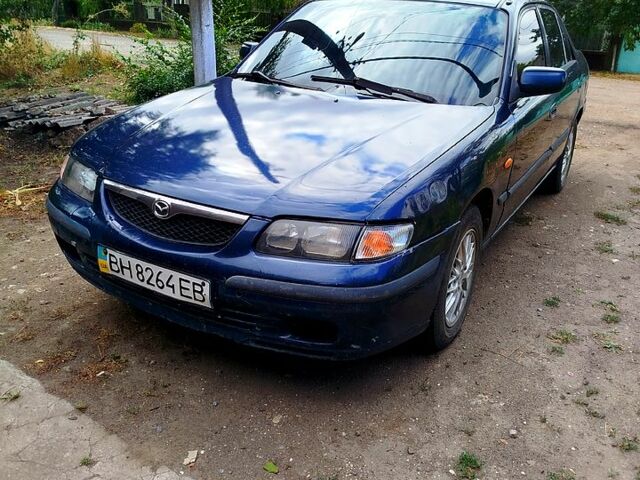Синий Мазда 626, объемом двигателя 1.8 л и пробегом 88 тыс. км за 1750 $, фото 1 на Automoto.ua