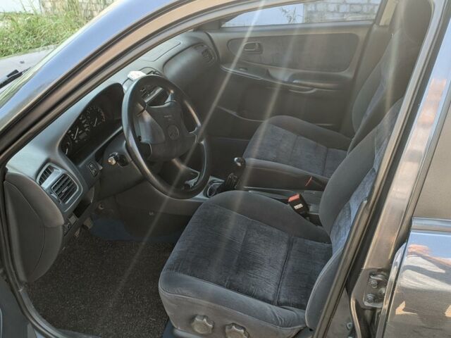 Синий Мазда 626, объемом двигателя 2 л и пробегом 220 тыс. км за 3300 $, фото 1 на Automoto.ua