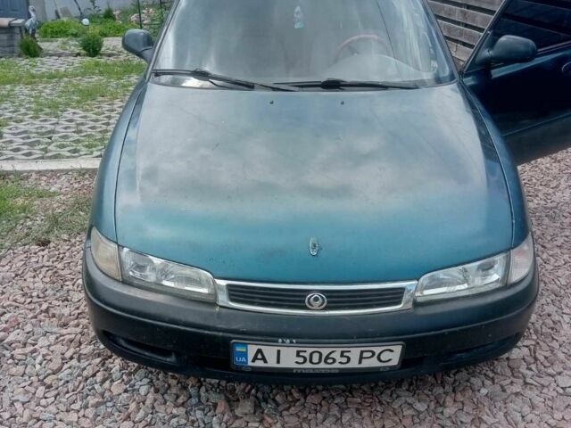 Синий Мазда 626, объемом двигателя 2 л и пробегом 350 тыс. км за 2000 $, фото 1 на Automoto.ua