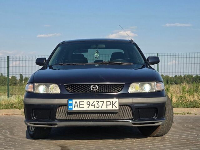 Синий Мазда 626, объемом двигателя 2 л и пробегом 390 тыс. км за 3000 $, фото 1 на Automoto.ua