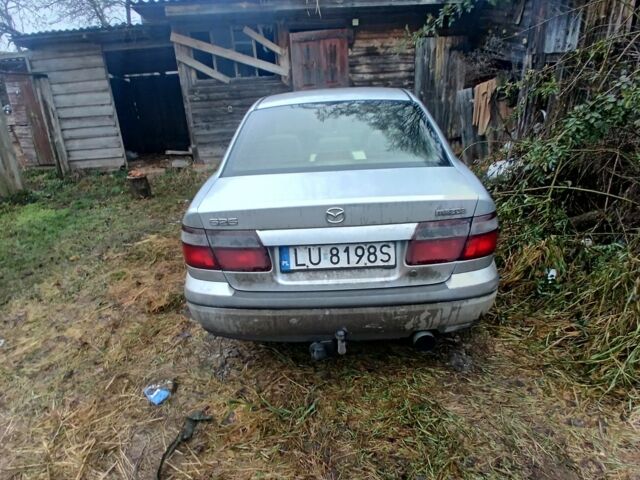 Синий Мазда 626, объемом двигателя 2 л и пробегом 300 тыс. км за 946 $, фото 1 на Automoto.ua