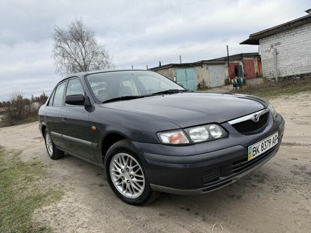 Синий Мазда 626, объемом двигателя 1.8 л и пробегом 247 тыс. км за 2000 $, фото 1 на Automoto.ua