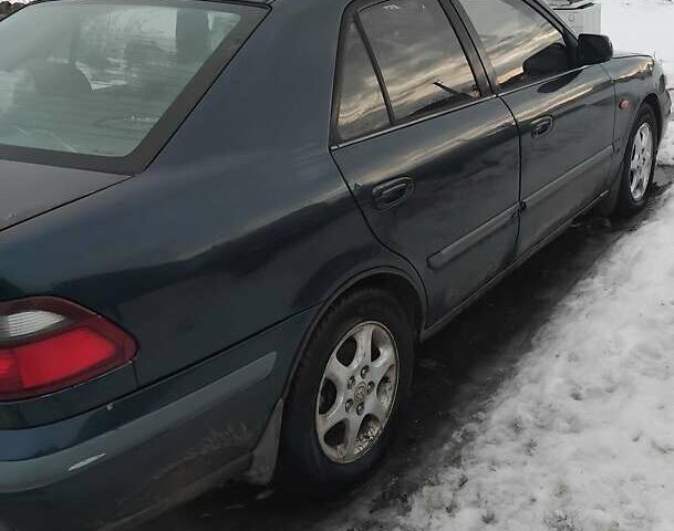 Синій Мазда 626, об'ємом двигуна 2 л та пробігом 300 тис. км за 1016 $, фото 1 на Automoto.ua