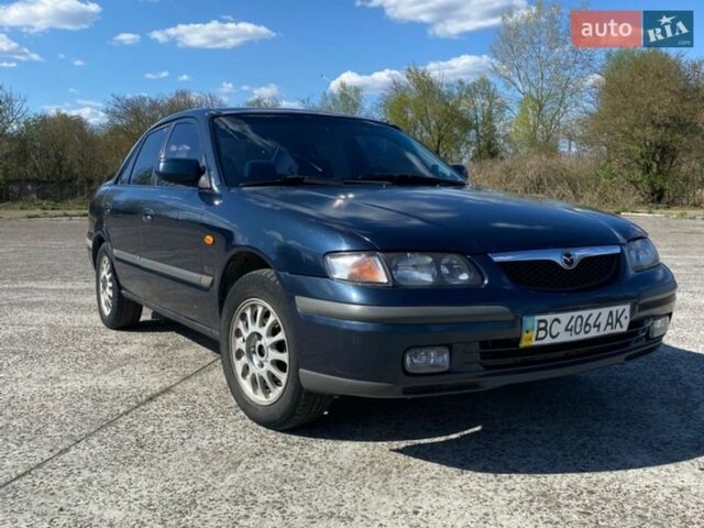 Синий Мазда 626, объемом двигателя 2 л и пробегом 330 тыс. км за 2000 $, фото 1 на Automoto.ua