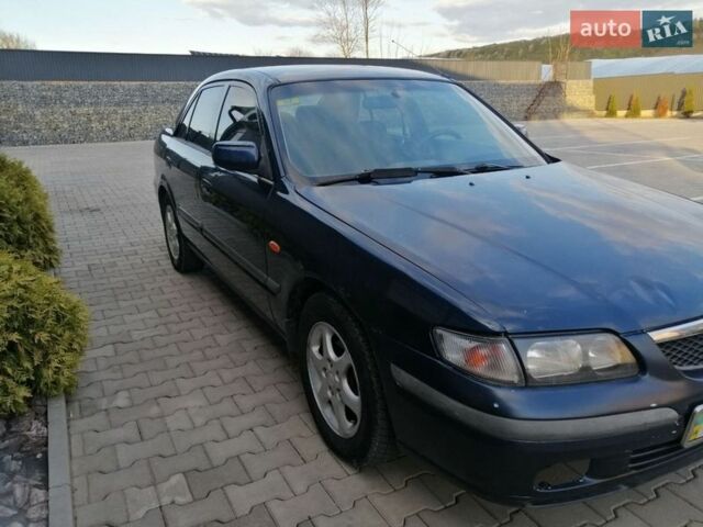 Синій Мазда 626, об'ємом двигуна 2 л та пробігом 311 тис. км за 1637 $, фото 1 на Automoto.ua