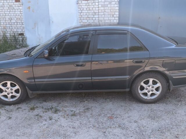 Синий Мазда 626, объемом двигателя 2 л и пробегом 220 тыс. км за 3300 $, фото 1 на Automoto.ua