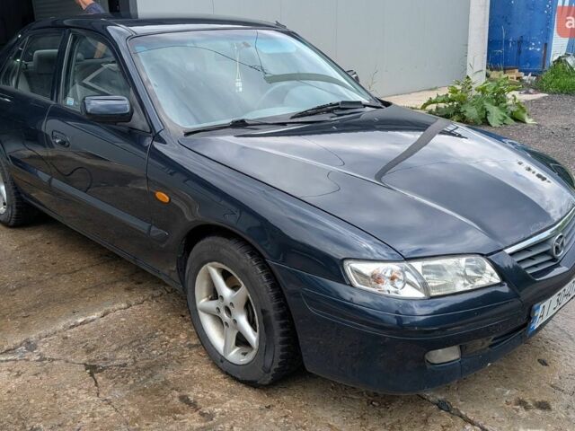 Синий Мазда 626, объемом двигателя 2 л и пробегом 385 тыс. км за 2900 $, фото 1 на Automoto.ua