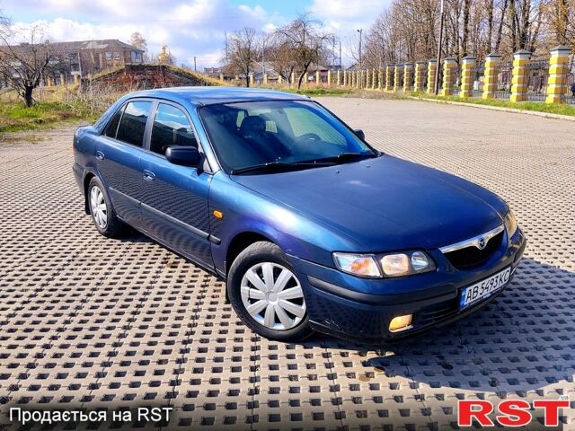 Синий Мазда 626, объемом двигателя 1.8 л и пробегом 393 тыс. км за 2400 $, фото 1 на Automoto.ua