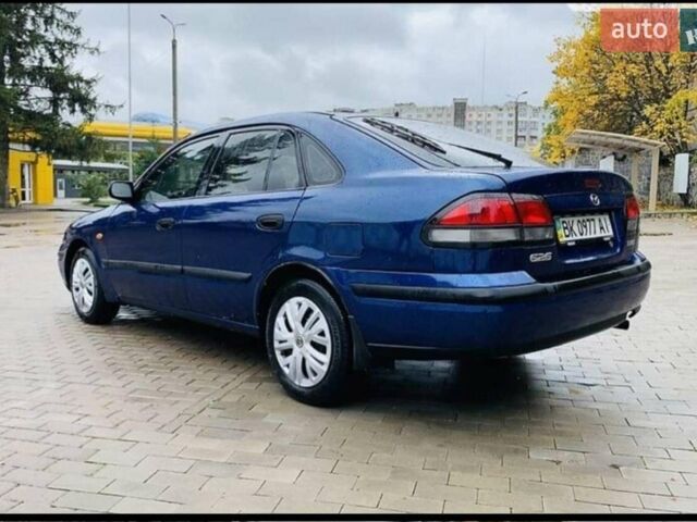 Синий Мазда 626, объемом двигателя 2 л и пробегом 320 тыс. км за 3200 $, фото 1 на Automoto.ua