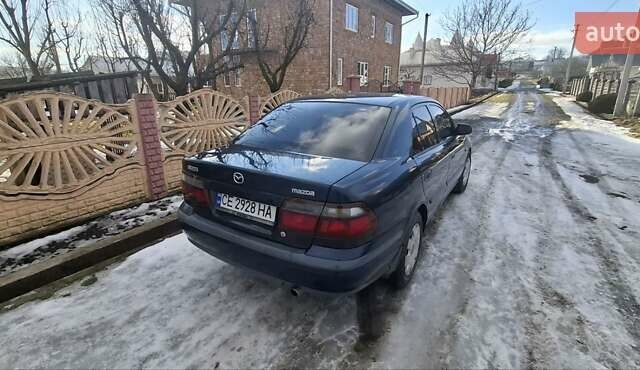 Синий Мазда 626, объемом двигателя 2 л и пробегом 310 тыс. км за 2500 $, фото 1 на Automoto.ua