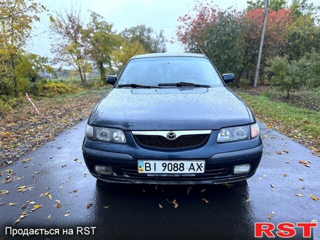 Синий Мазда 626, объемом двигателя 2 л и пробегом 200 тыс. км за 2750 $, фото 1 на Automoto.ua