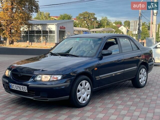 Синий Мазда 626, объемом двигателя 2 л и пробегом 300 тыс. км за 2090 $, фото 1 на Automoto.ua