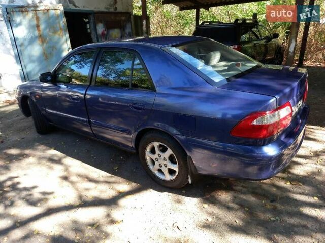 Синий Мазда 626, объемом двигателя 2 л и пробегом 238 тыс. км за 2600 $, фото 1 на Automoto.ua