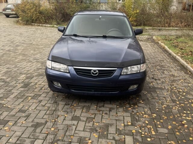 Синий Мазда 626, объемом двигателя 1.8 л и пробегом 395 тыс. км за 1500 $, фото 1 на Automoto.ua