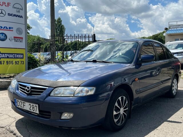 Синий Мазда 626, объемом двигателя 18 л и пробегом 391 тыс. км за 1200 $, фото 1 на Automoto.ua