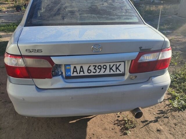 Синий Мазда 626, объемом двигателя 2 л и пробегом 400 тыс. км за 669 $, фото 1 на Automoto.ua