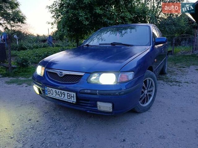 Синий Мазда 626, объемом двигателя 1.84 л и пробегом 311 тыс. км за 1850 $, фото 1 на Automoto.ua