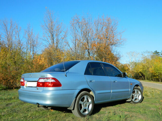 Синий Мазда 626, объемом двигателя 2 л и пробегом 310 тыс. км за 5500 $, фото 1 на Automoto.ua