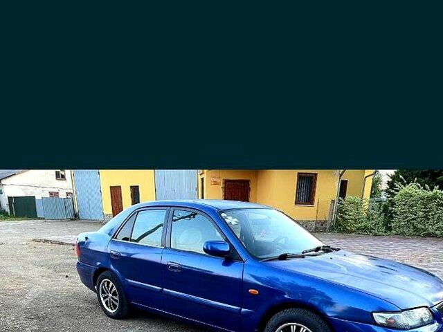 Синий Мазда 626, объемом двигателя 1.8 л и пробегом 350 тыс. км за 3200 $, фото 1 на Automoto.ua