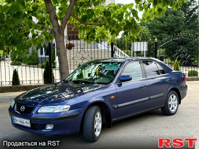 Синий Мазда 626, объемом двигателя 2 л и пробегом 250 тыс. км за 2650 $, фото 1 на Automoto.ua