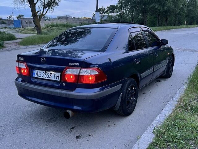 Синий Мазда 626, объемом двигателя 2 л и пробегом 350 тыс. км за 2500 $, фото 1 на Automoto.ua