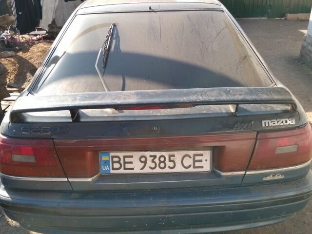 Синий Мазда 626, объемом двигателя 2 л и пробегом 800 тыс. км за 1100 $, фото 1 на Automoto.ua