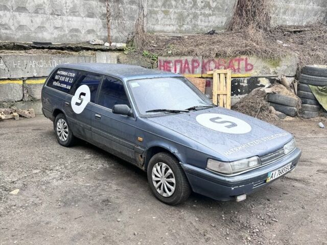 Синий Мазда 626, объемом двигателя 2 л и пробегом 200 тыс. км за 1000 $, фото 1 на Automoto.ua