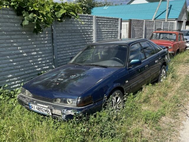 Синий Мазда 626, объемом двигателя 0 л и пробегом 1000 тыс. км за 1650 $, фото 1 на Automoto.ua