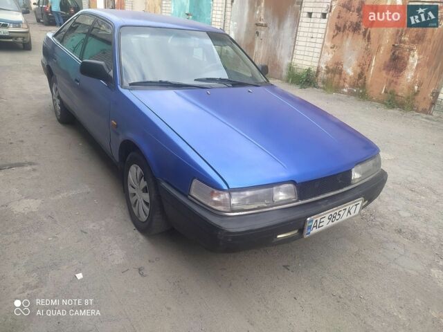 Синий Мазда 626, объемом двигателя 2 л и пробегом 200 тыс. км за 830 $, фото 1 на Automoto.ua
