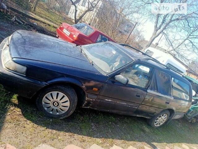 Синий Мазда 626, объемом двигателя 2 л и пробегом 575 тыс. км за 750 $, фото 1 на Automoto.ua