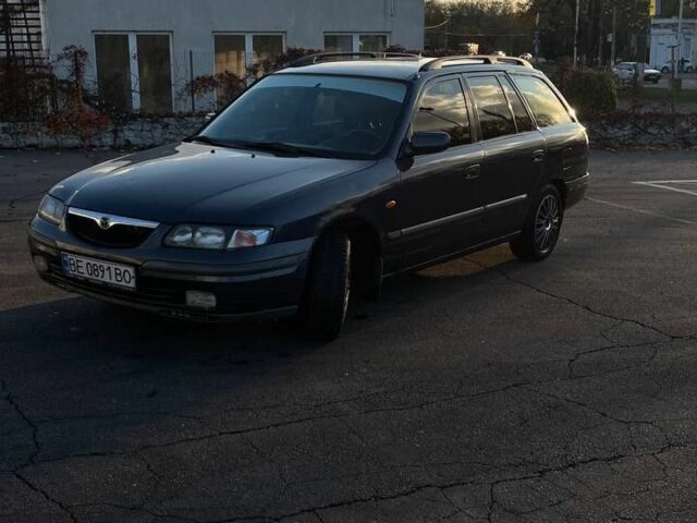 Синій Мазда 626, об'ємом двигуна 1.8 л та пробігом 320 тис. км за 3200 $, фото 1 на Automoto.ua