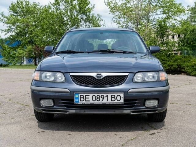 Синий Мазда 626, объемом двигателя 1.8 л и пробегом 344 тыс. км за 2550 $, фото 1 на Automoto.ua