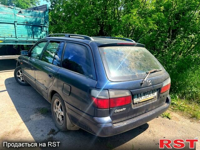 Синий Мазда 626, объемом двигателя 2 л и пробегом 355 тыс. км за 2300 $, фото 1 на Automoto.ua