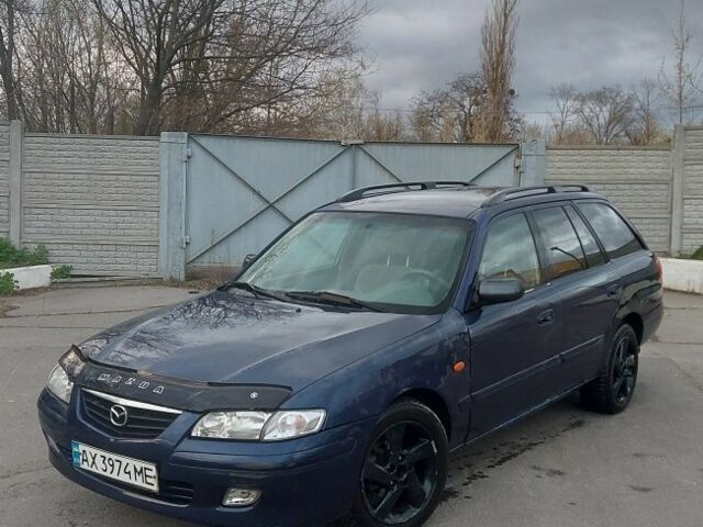 Синий Мазда 626, объемом двигателя 2 л и пробегом 290 тыс. км за 1800 $, фото 1 на Automoto.ua