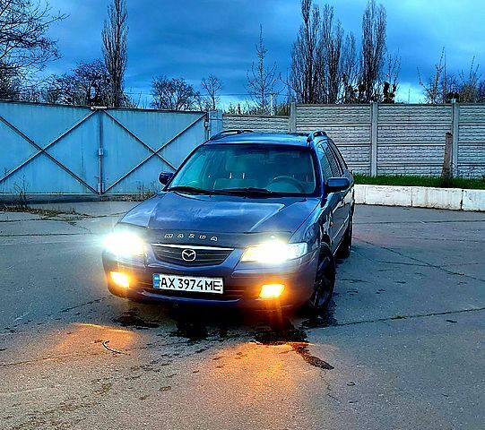 Синий Мазда 626, объемом двигателя 2 л и пробегом 300 тыс. км за 1600 $, фото 1 на Automoto.ua
