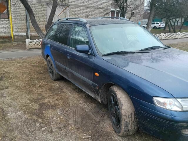 Синий Мазда 626, объемом двигателя 2 л и пробегом 350 тыс. км за 728 $, фото 1 на Automoto.ua