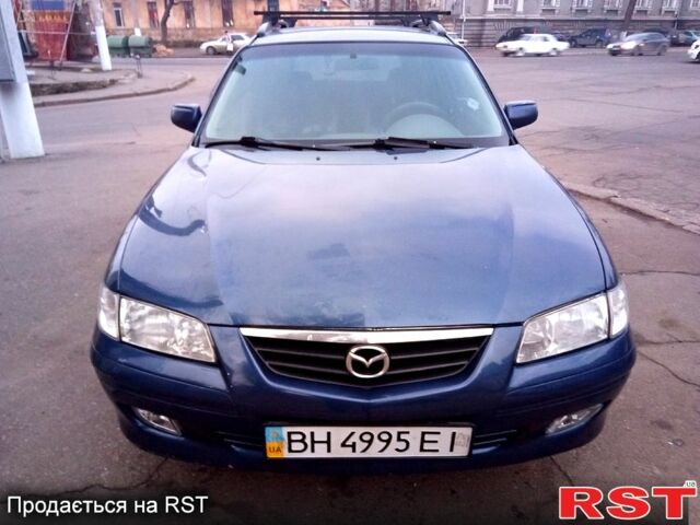 Синій Мазда 626, об'ємом двигуна 2 л та пробігом 348 тис. км за 2600 $, фото 1 на Automoto.ua