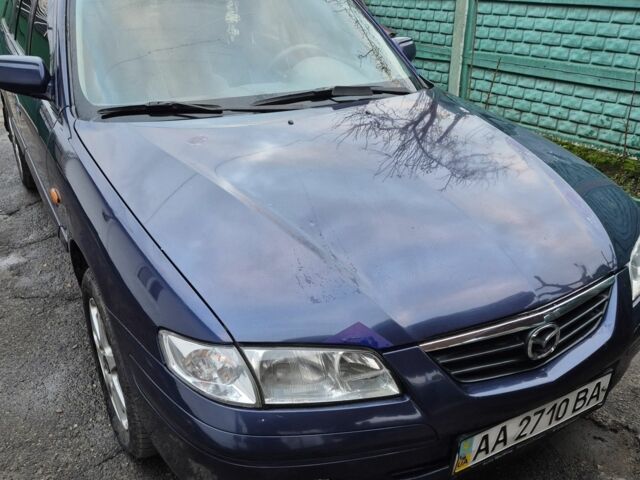 Синий Мазда 626, объемом двигателя 2 л и пробегом 245 тыс. км за 2500 $, фото 1 на Automoto.ua