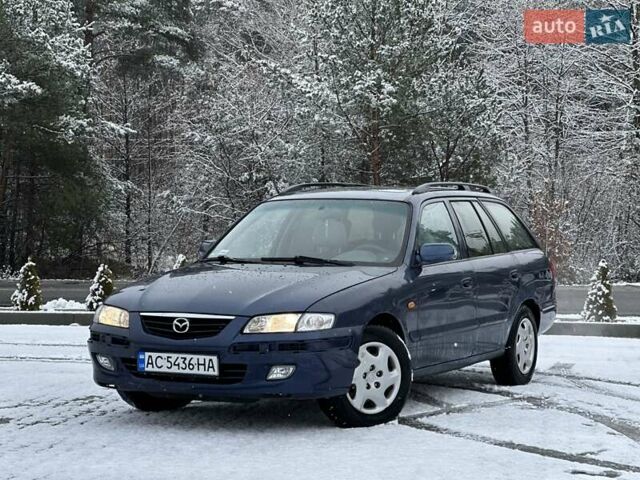 Синій Мазда 626, об'ємом двигуна 2 л та пробігом 294 тис. км за 1999 $, фото 1 на Automoto.ua