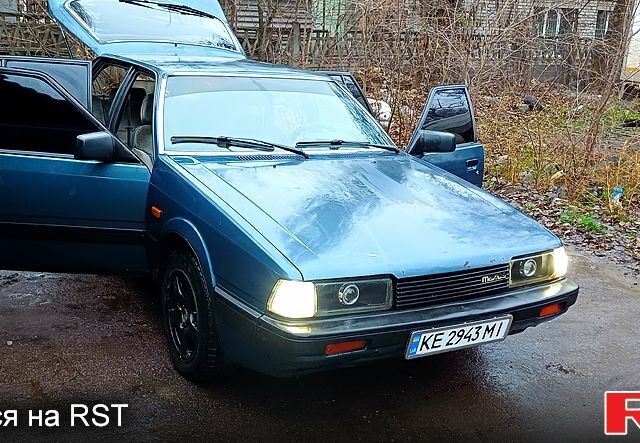 Синій Мазда 626, об'ємом двигуна 2 л та пробігом 348 тис. км за 2000 $, фото 1 на Automoto.ua