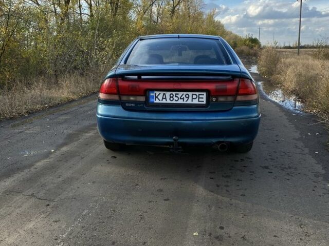 Синий Мазда 626, объемом двигателя 2 л и пробегом 325 тыс. км за 1790 $, фото 1 на Automoto.ua