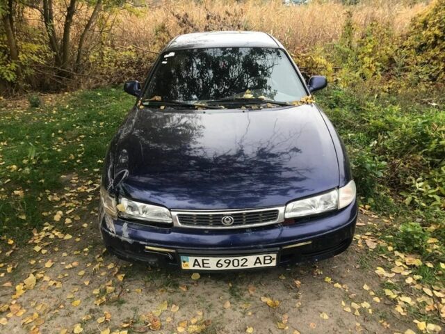 Синій Мазда 626, об'ємом двигуна 1.8 л та пробігом 214 тис. км за 599 $, фото 1 на Automoto.ua