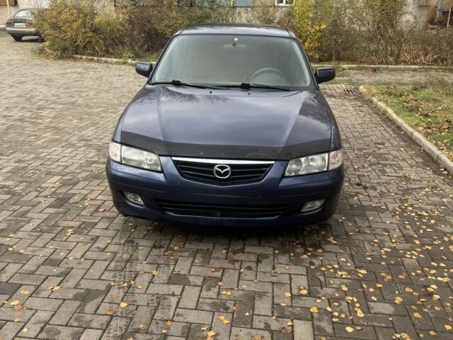 Синий Мазда 626, объемом двигателя 1.8 л и пробегом 346 тыс. км за 1500 $, фото 1 на Automoto.ua