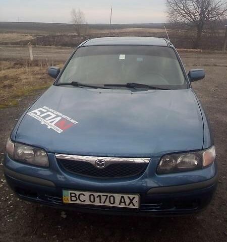 Синий Мазда 626, объемом двигателя 2 л и пробегом 325 тыс. км за 4500 $, фото 1 на Automoto.ua