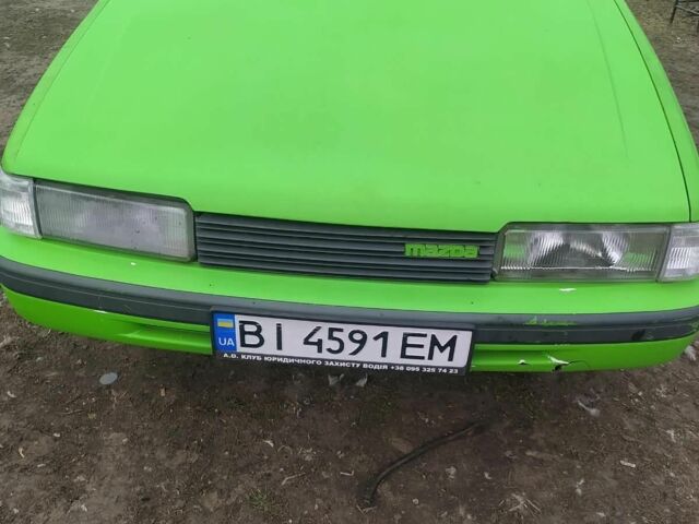 Зеленый Мазда 626, объемом двигателя 2 л и пробегом 120 тыс. км за 557 $, фото 1 на Automoto.ua