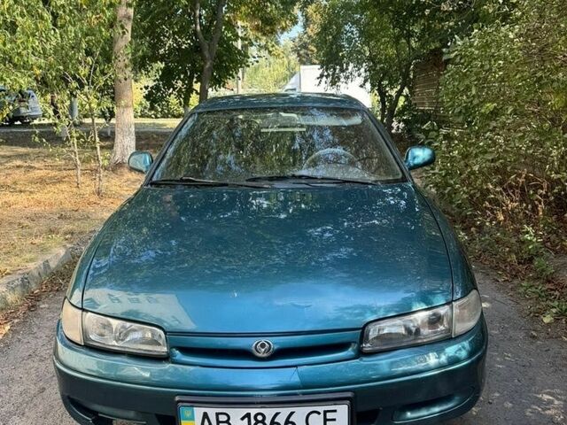 Зелений Мазда 626, об'ємом двигуна 2 л та пробігом 335 тис. км за 1250 $, фото 1 на Automoto.ua